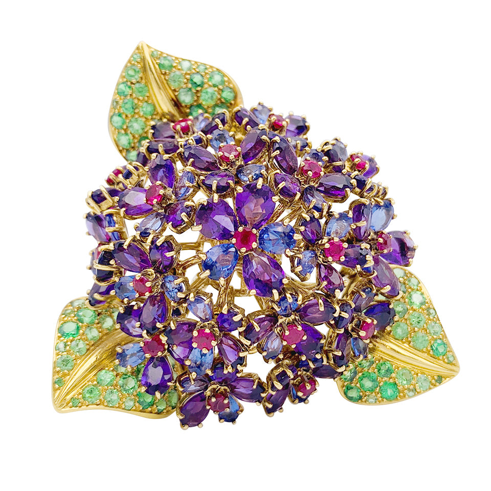 Clip René Boivin,"Bouquet de Violettes", or jaune, gemmes de couleur. 6