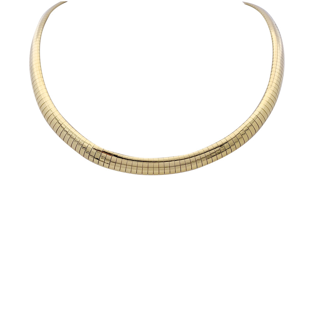 Collier vintage omega or jaune. 1