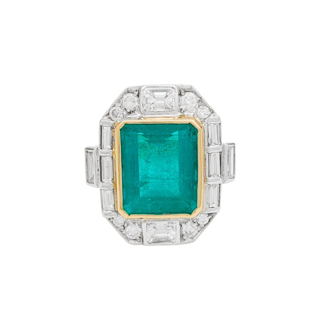 Bague deux ors émeraude et diamants. 1