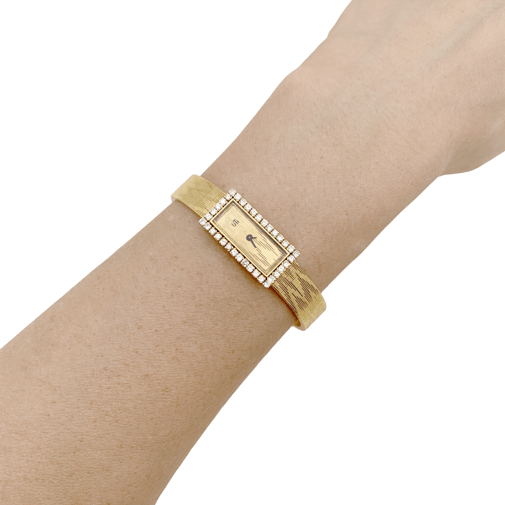 Montre vintage UTI, mouvement Blancpain, or jaune, diamants. 7