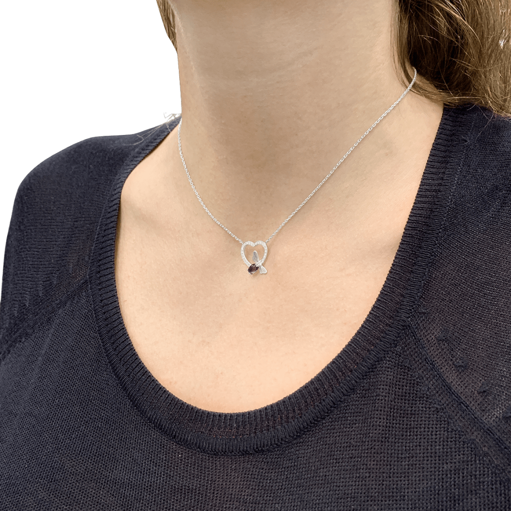 Collier Chaumet, « Attrape-moi si tu m’aimes », or blanc, améthyste, diamants. 5