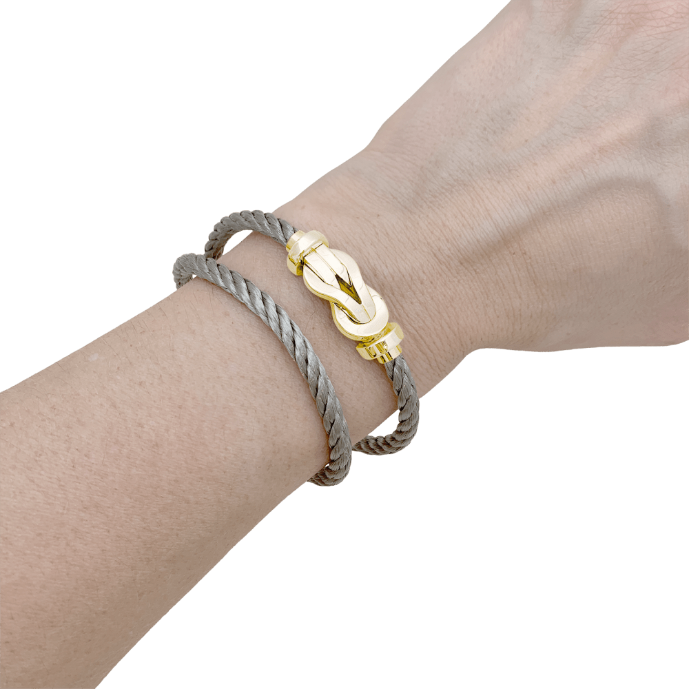 Bracelet Fred, "Chance infinie", or rose et acier. 7