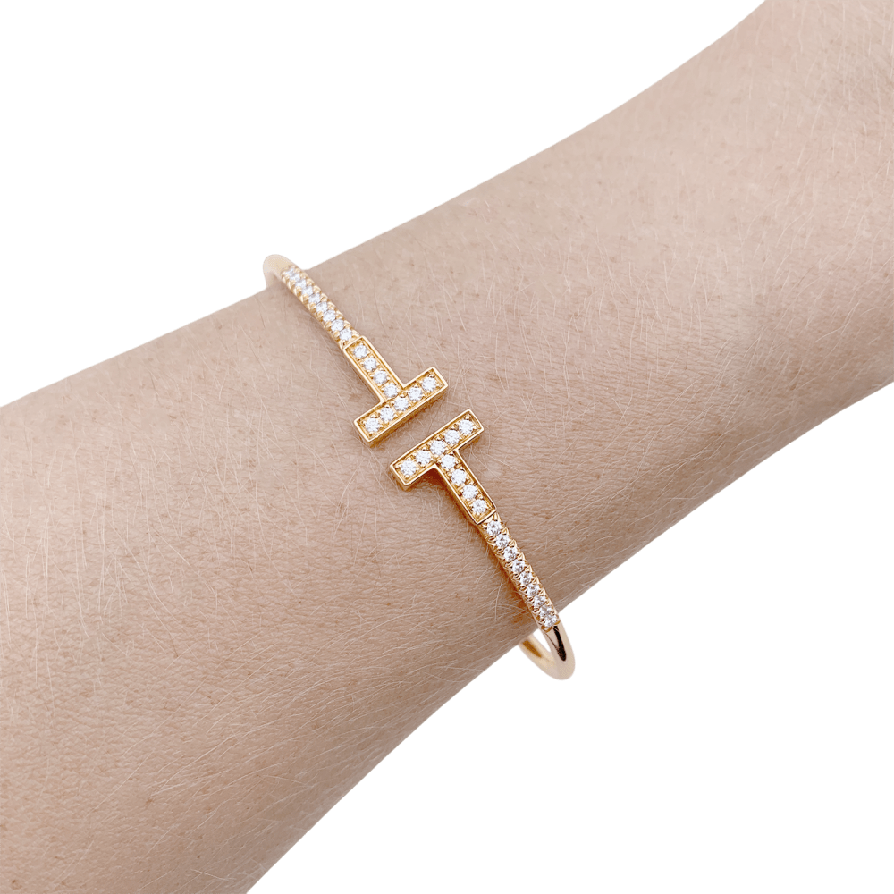 Bracelet Tiffany "Wire Tiffany T" en or rose et diamants. 4