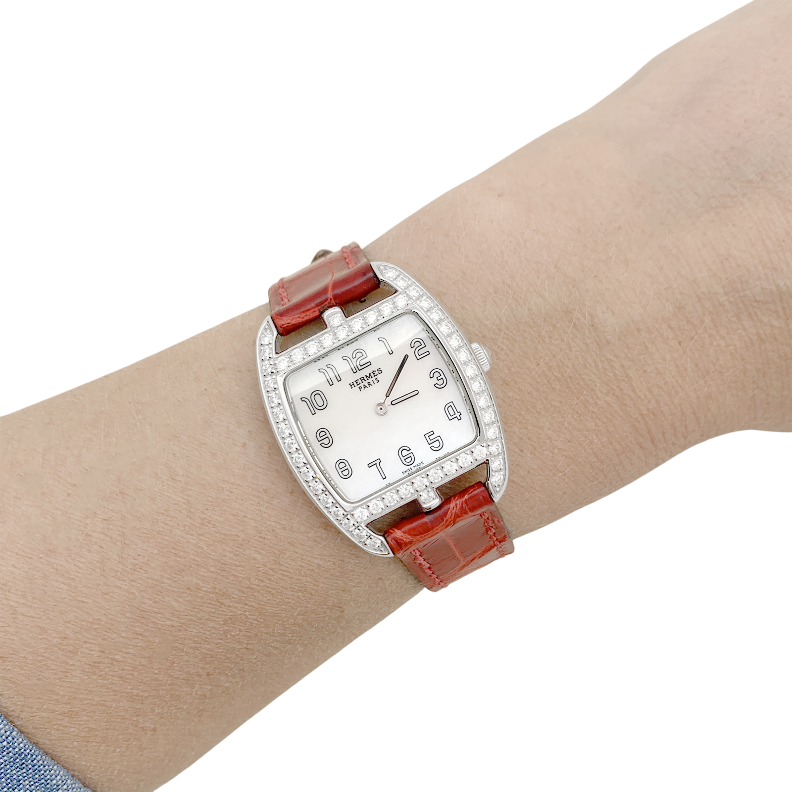 Montre Hermès modèle "Cape Cod Tonneau" en acier et diamants sur cuir. 6