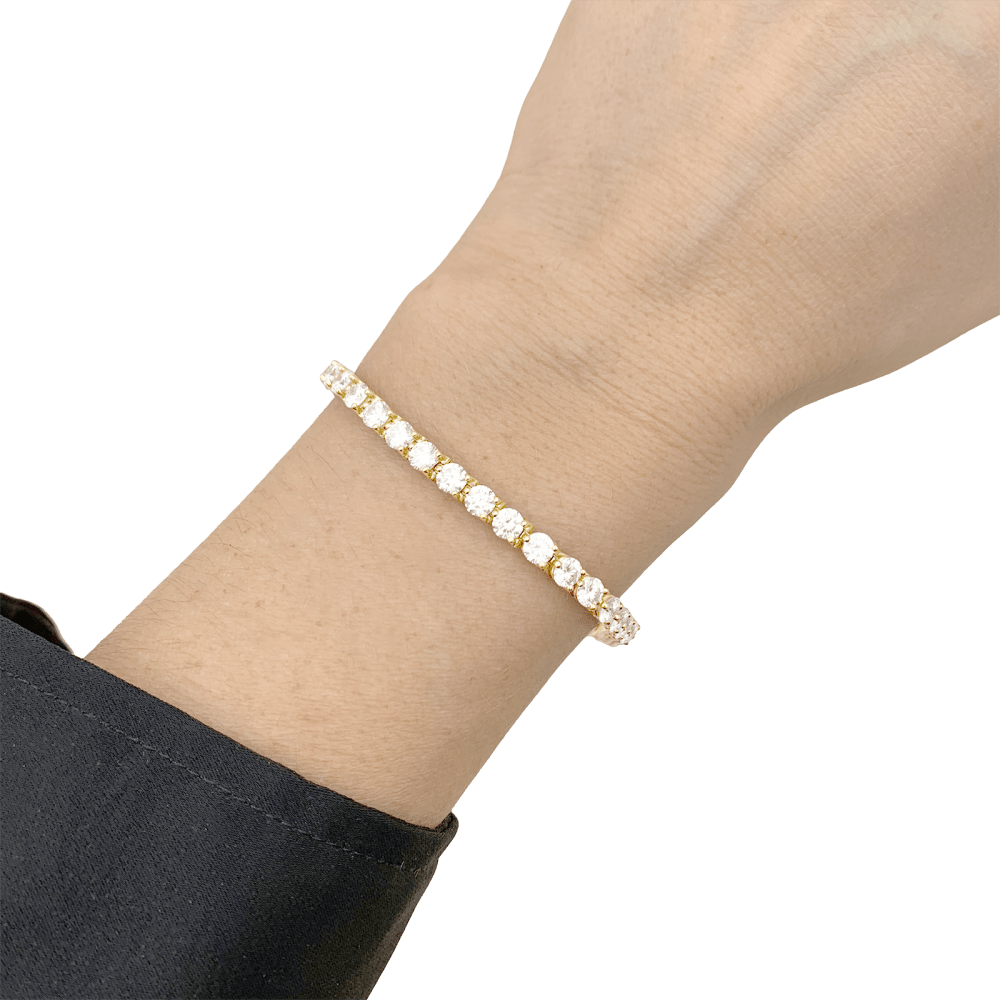 Bracelet ligne Cartier, or jaune et diamants. 7