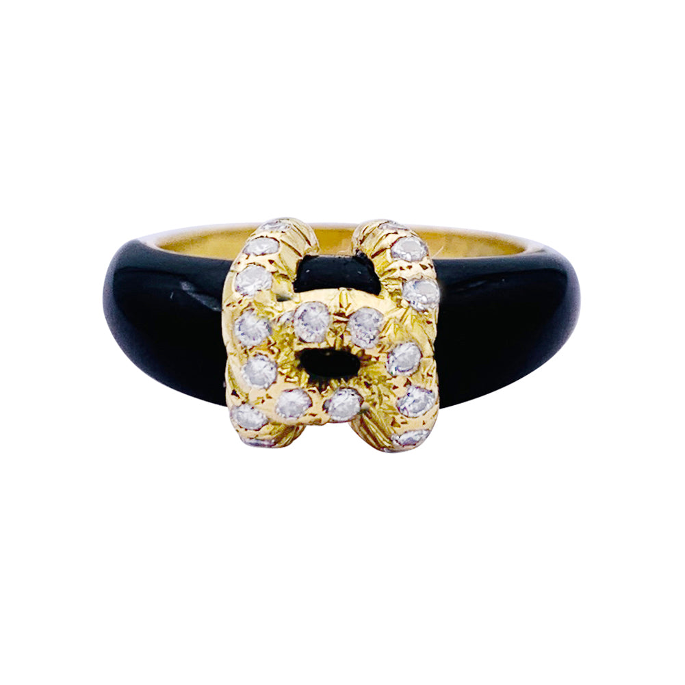 Bague Cartier, "Double C", or jaune, onyx, diamants. 3