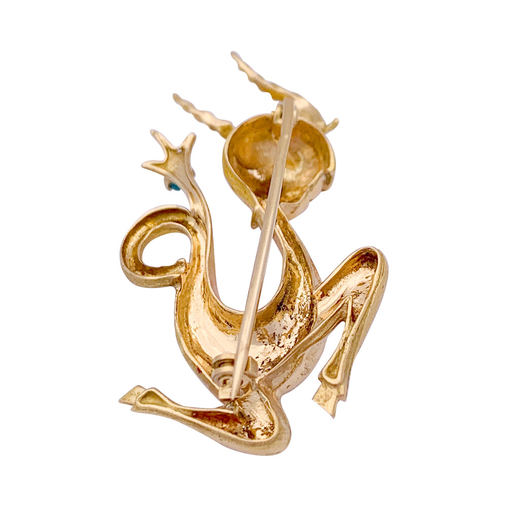 Broche vintage "Capricorne", or jaune, turquoise. 1