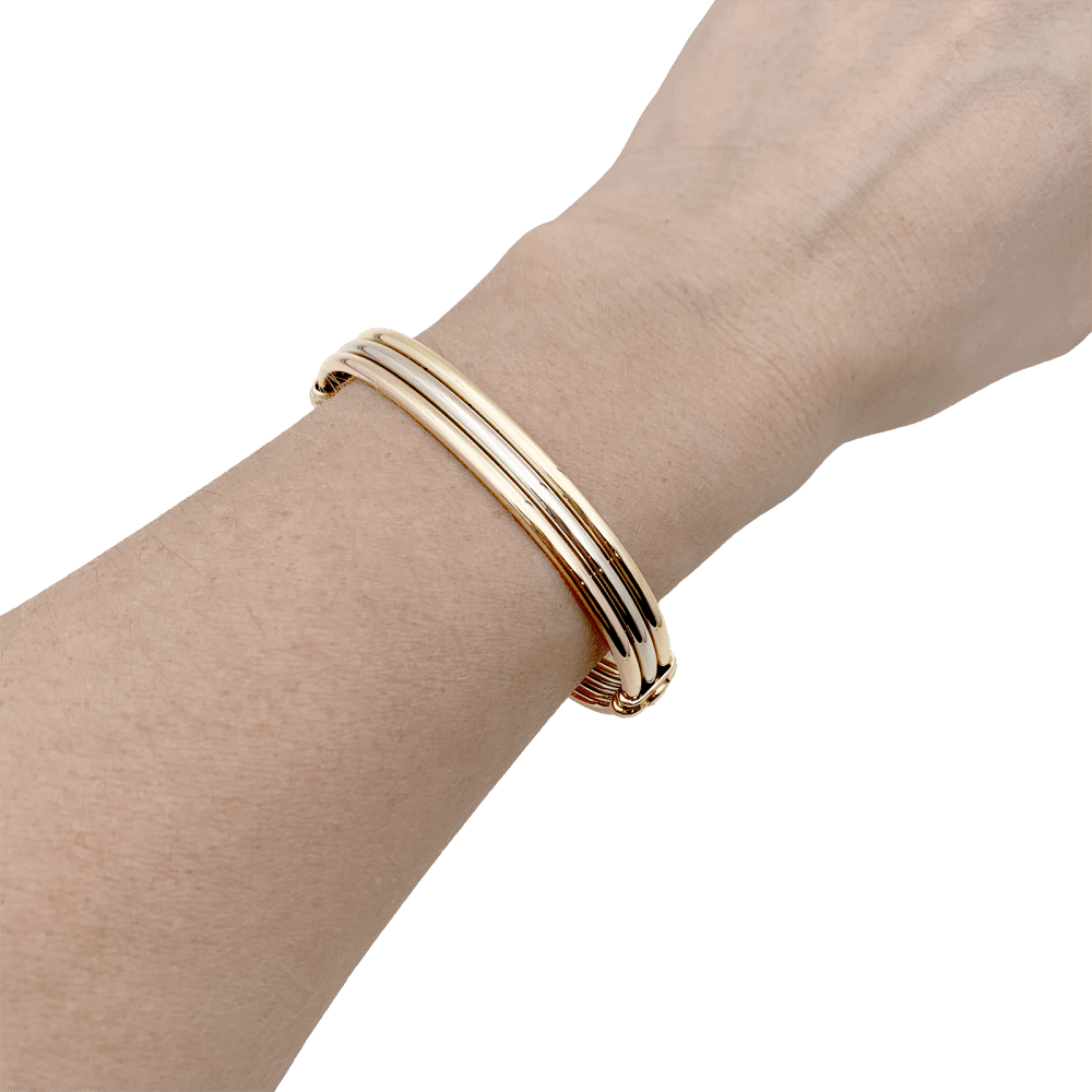 Bracelet CARTIER, « Vétéran » 3 tons d'or. 7