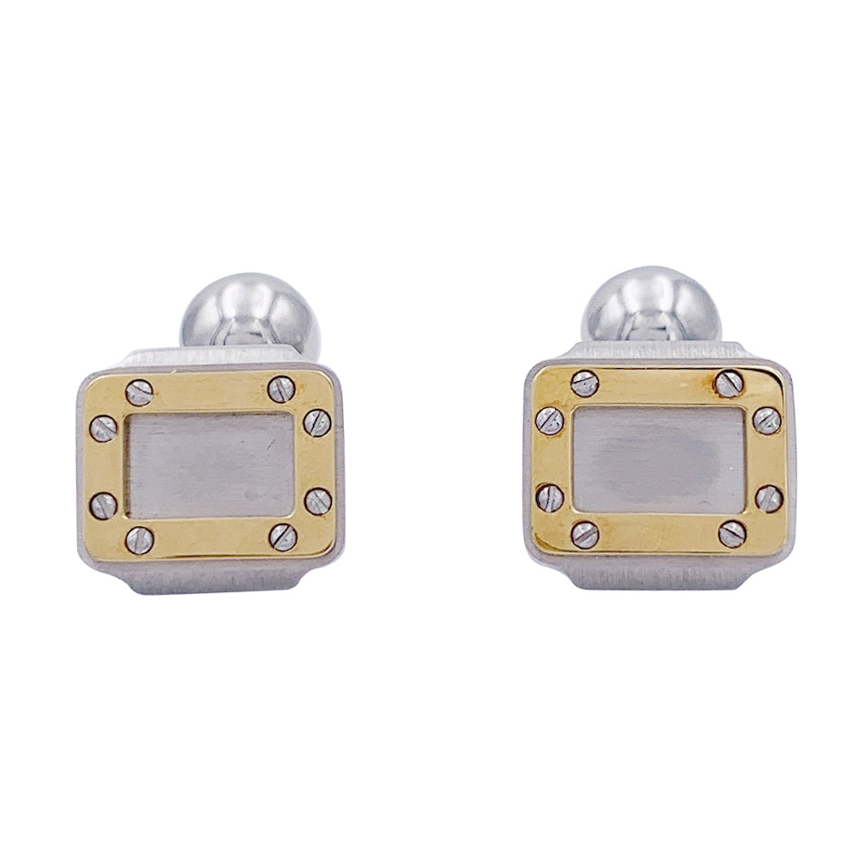 Boutons de manchette Cartier, "Santos Dumont", or et acier. 1