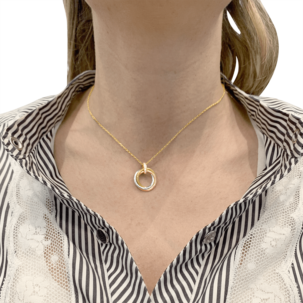 Collier Cartier, "Trinity", trois ors, diamants. 7