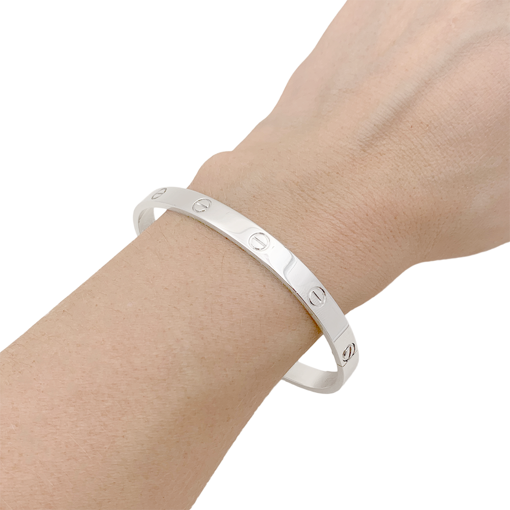 Bracelet Cartier "Love" or blanc. 4