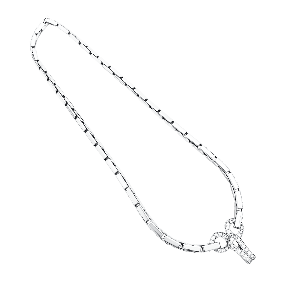 Collier Cartier "Agrafe" en or blanc et diamants. 3