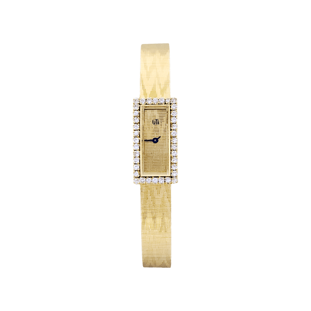 Montre vintage UTI, mouvement Blancpain, or jaune, diamants. 1