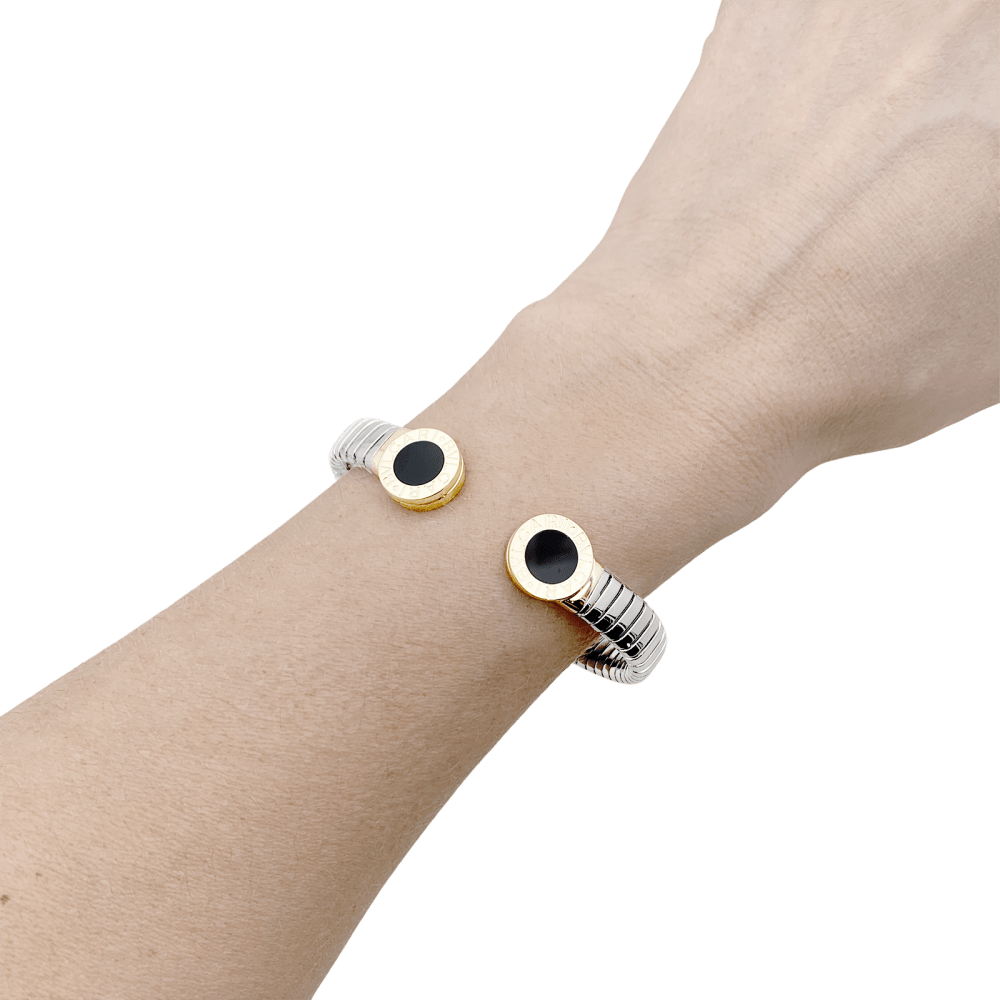 Bracelet Bulgari, "Bulgari-Bulgari", acier, or jaune et onyx. 35154 7