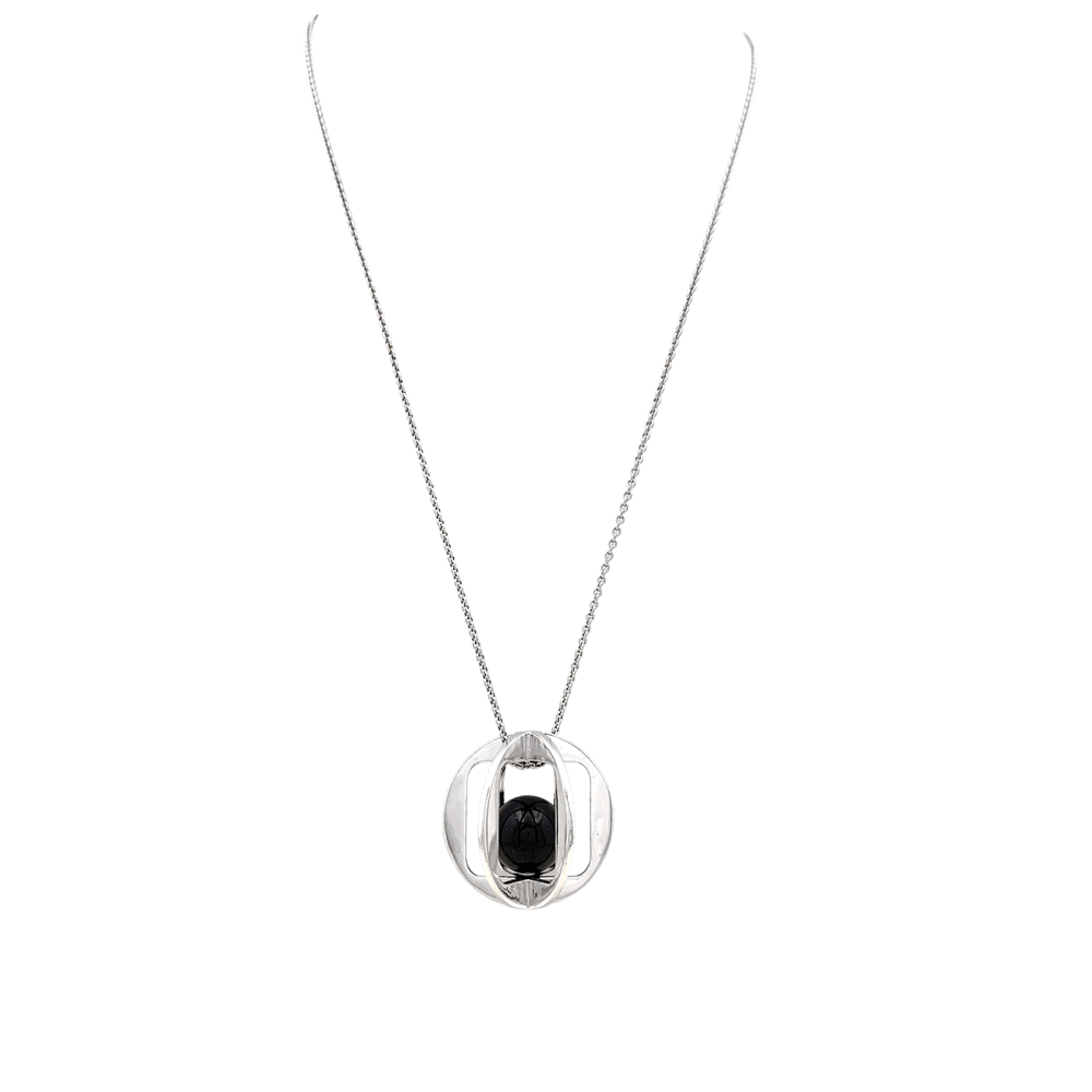 Sautoir Dinh Van, "Sphère", argent et onyx.  1