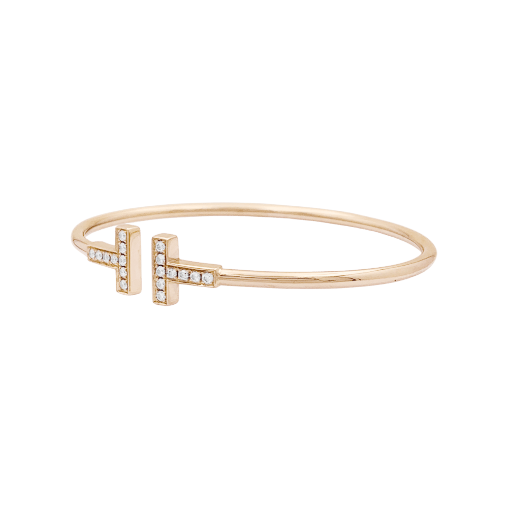 Bracelet Tiffany & Co, "Wire Tiffany T", or rose et diamants.  2