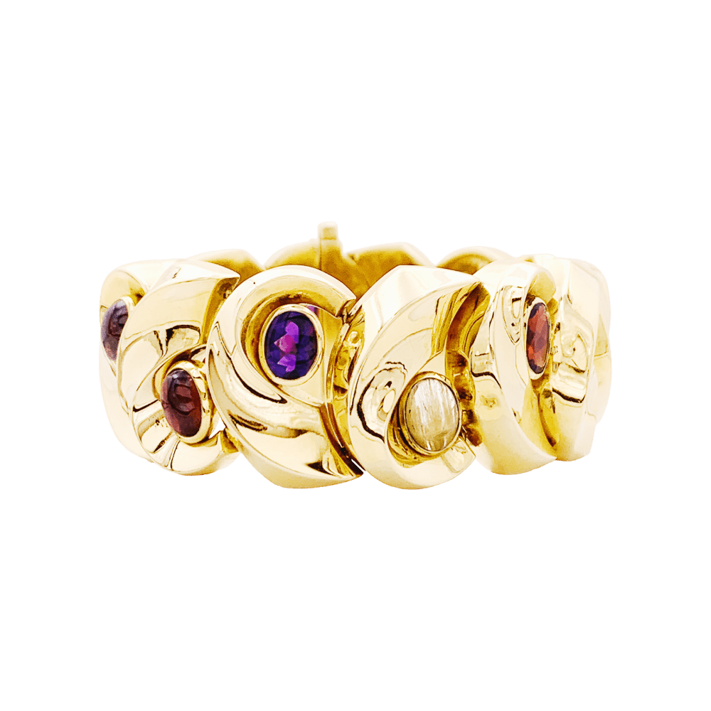 Bracelet or jaune, pierres de couleur.  1