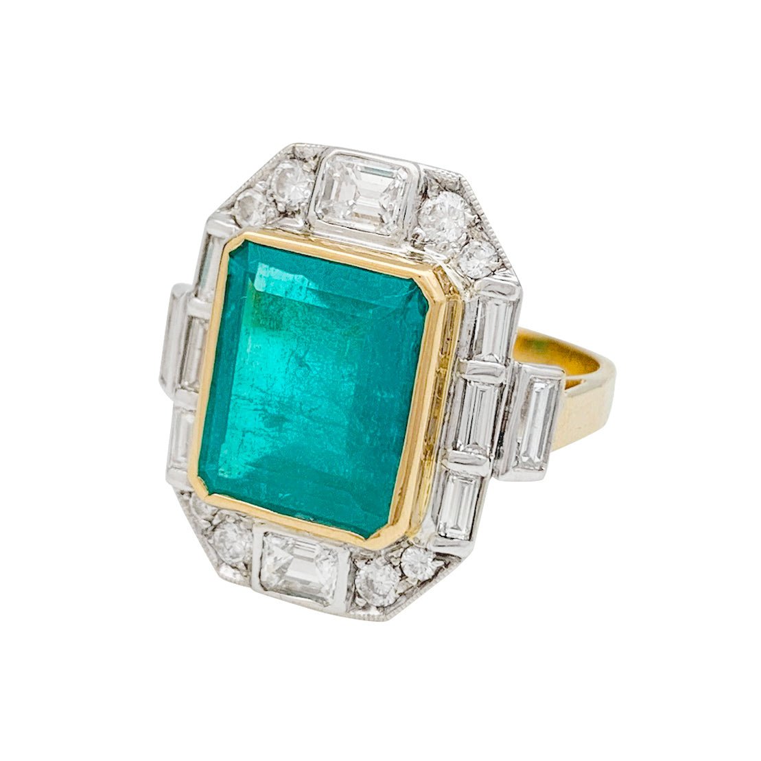 Bague deux ors émeraude et diamants. 4