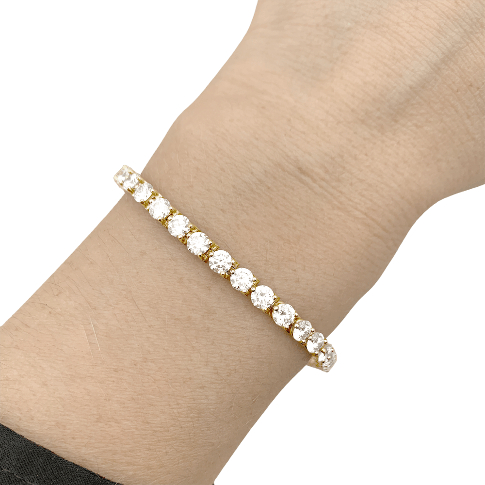 Bracelet ligne Cartier, or jaune et diamants.  6