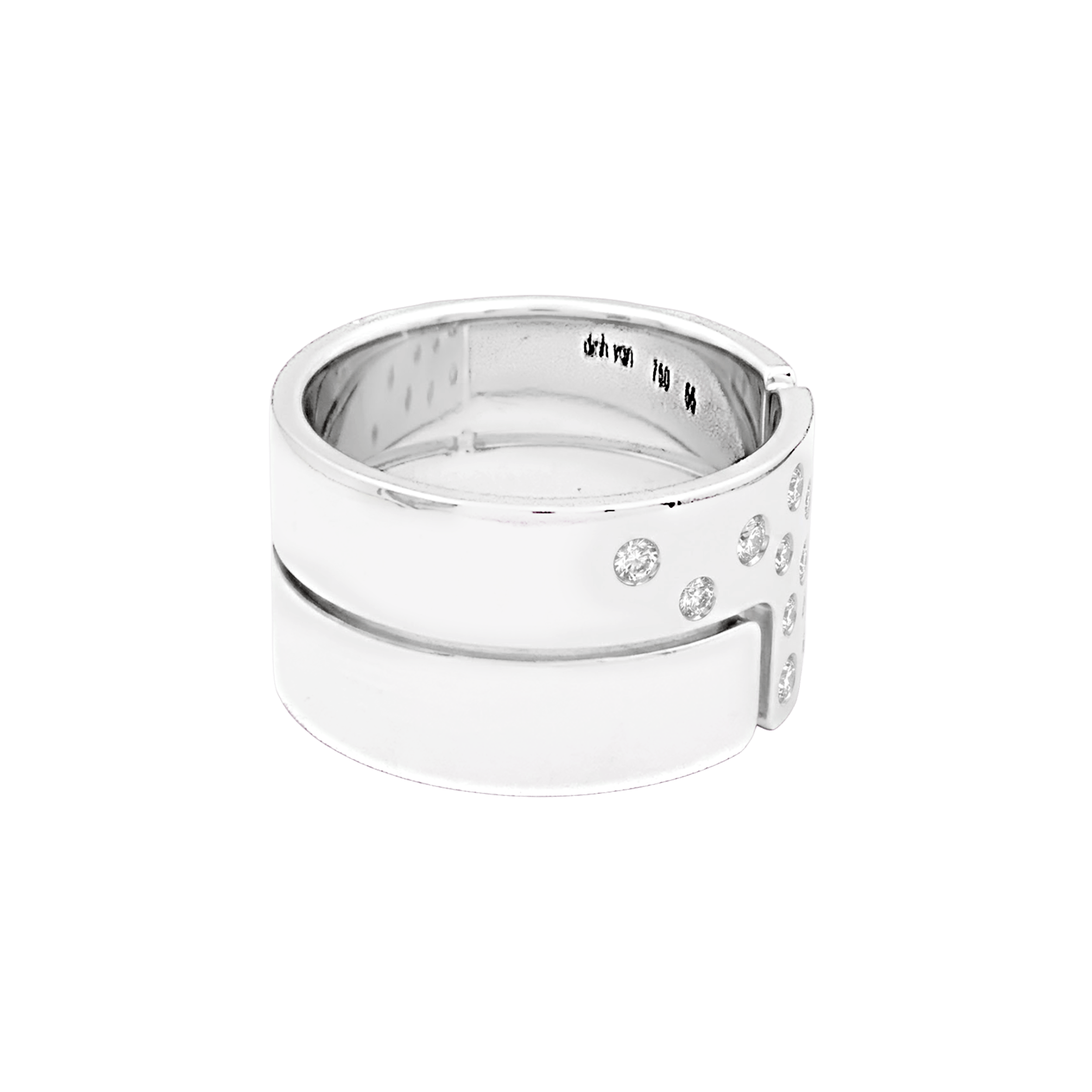 Bague Dinh Van, "Seventies" en or blanc et diamants.  2