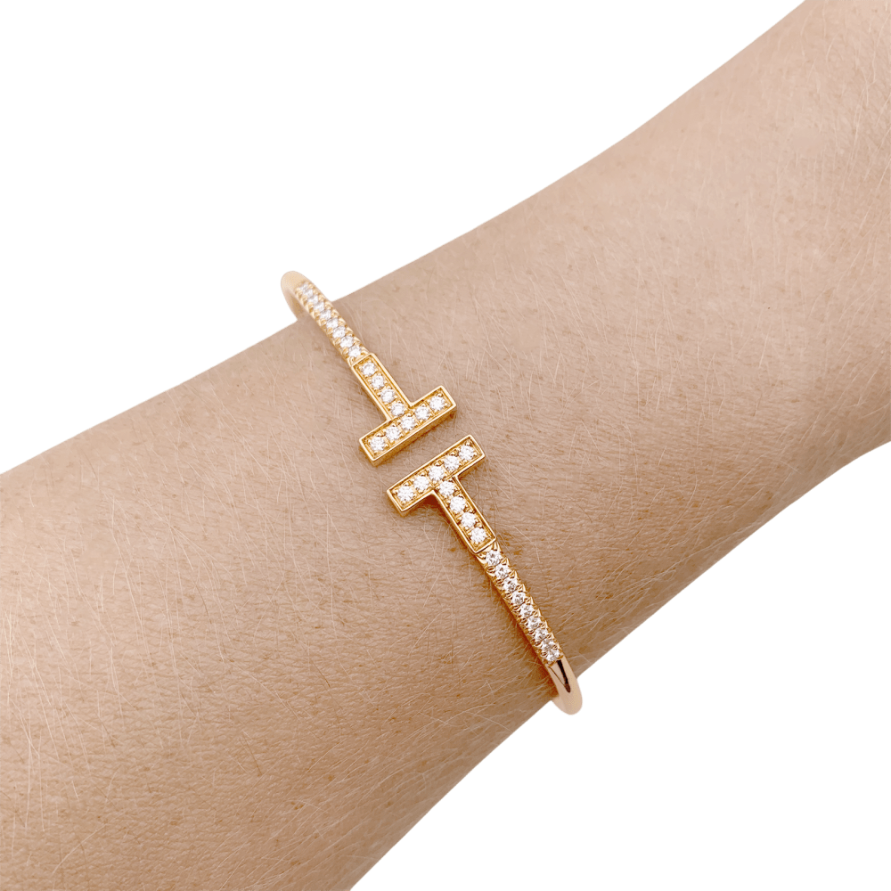 Bracelet Tiffany "Wire Tiffany T" en or rose et diamants. 5