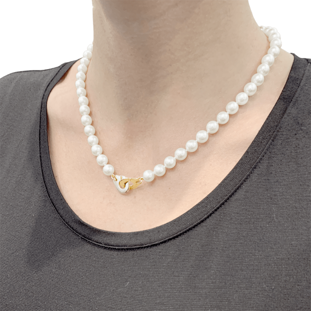 Collier de perles Dinh Van, "Menottes R12", en or jaune.  5