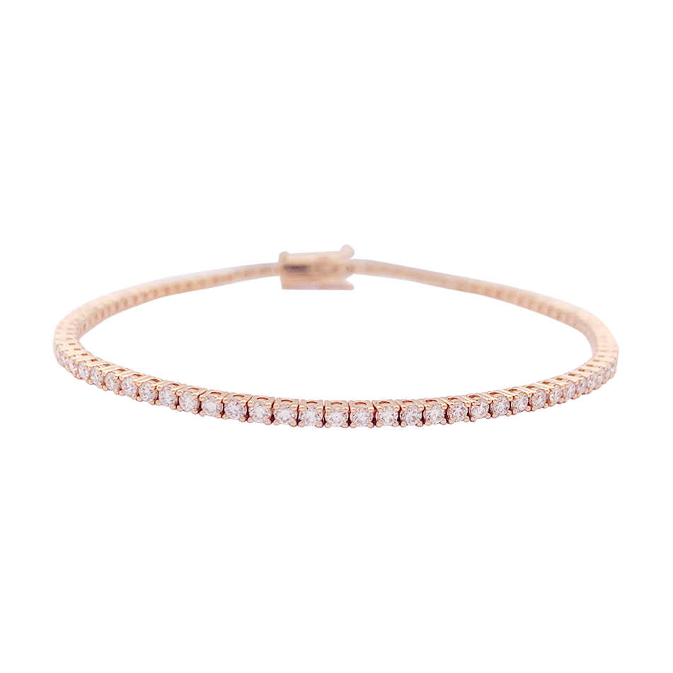 Bracelet ligne tennis or rose, diamants. 1