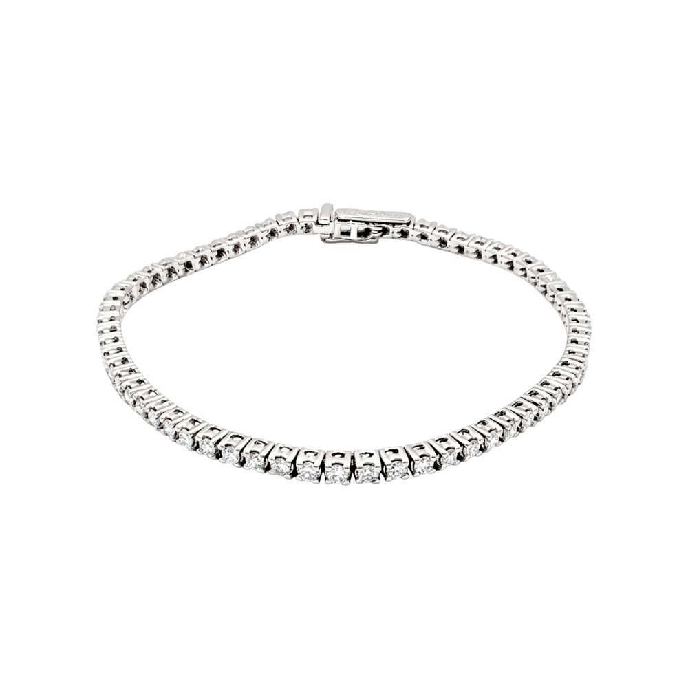 Bracelet ligne, or blanc et diamants.  2