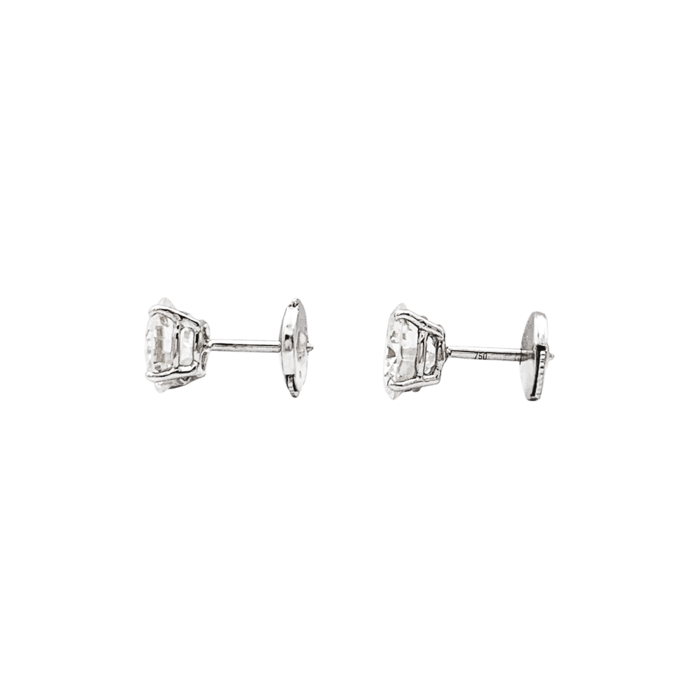 Puces d'oreilles diamants et or blanc.  4