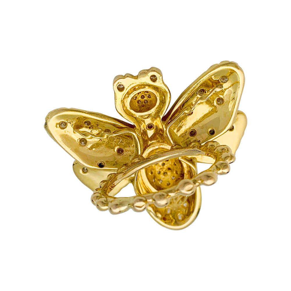 Une bague Garnazelle figurant un papillon en or jaune 750/000, rehaussé de diamants taille brillant. Poids brut: 20 grammes 5