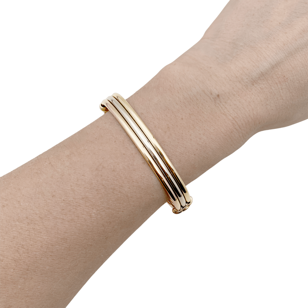 Bracelet CARTIER, « Vétéran » 3 tons d'or.  6