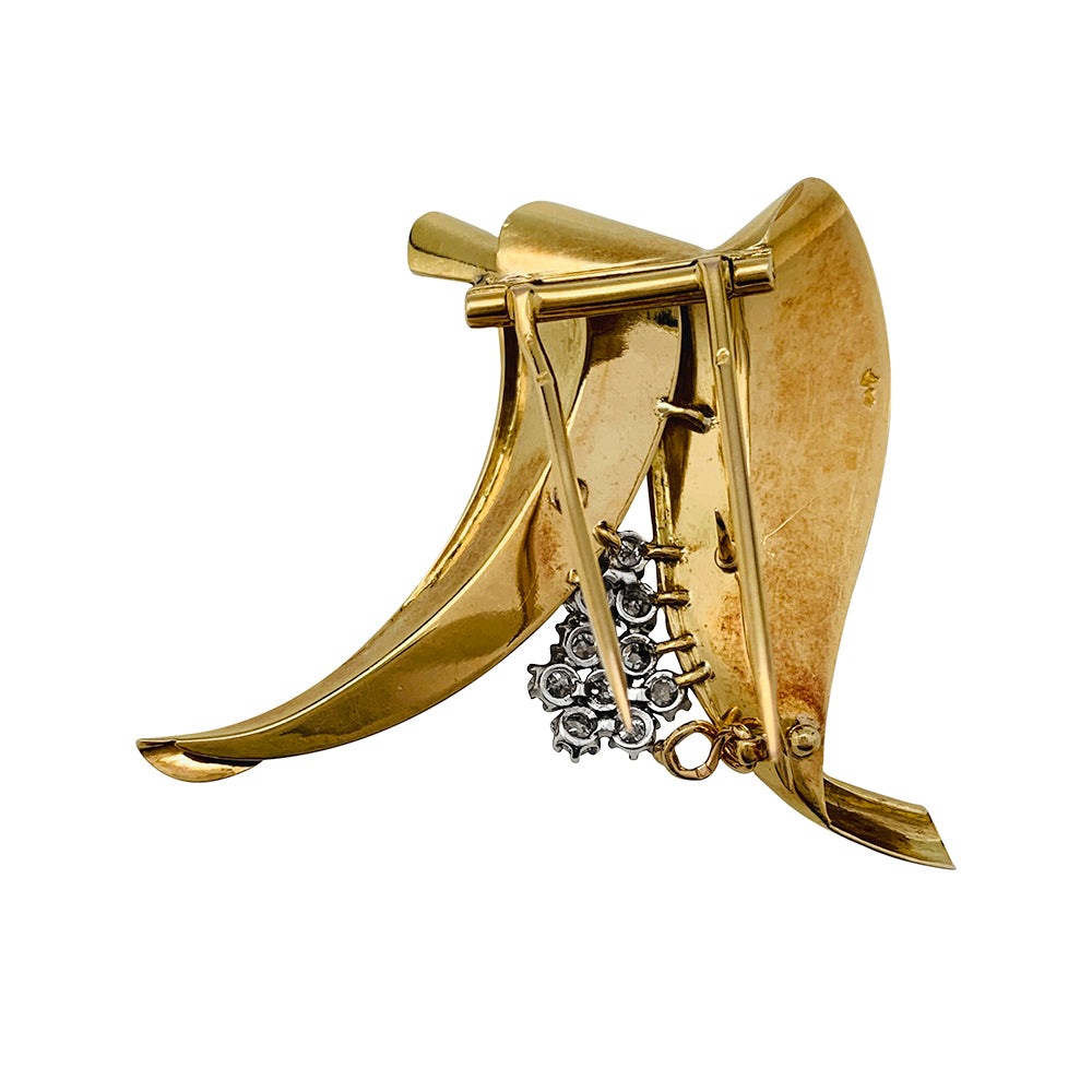 Broche Fontana en or jaune 750/000 et platine 950/000 sertie de 10 diamants taille ancienne. Poids brut : 11,4 grammes. 5