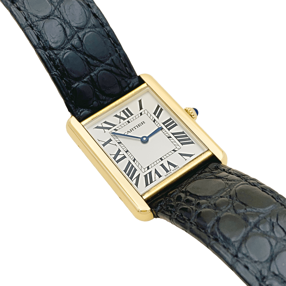 Montre Cartier, "Tank Solo", or jaune et acier.  2
