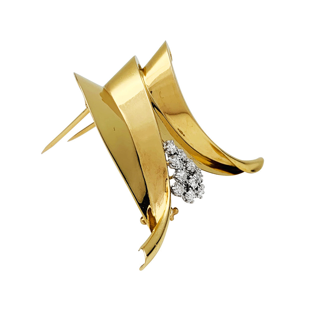 Broche Fontana en or jaune 750/000 et platine 950/000 sertie de 10 diamants taille ancienne. Poids brut : 11,4 grammes. 6