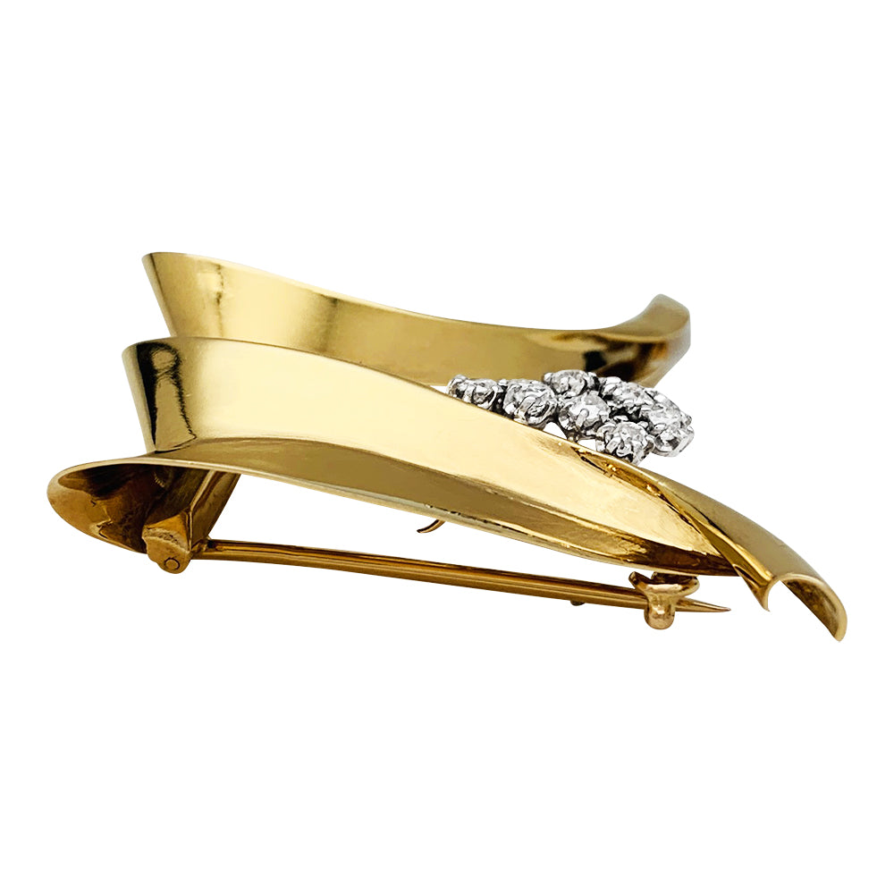 Broche Fontana en or jaune 750/000 et platine 950/000 sertie de 10 diamants taille ancienne. Poids brut : 11,4 grammes. 7