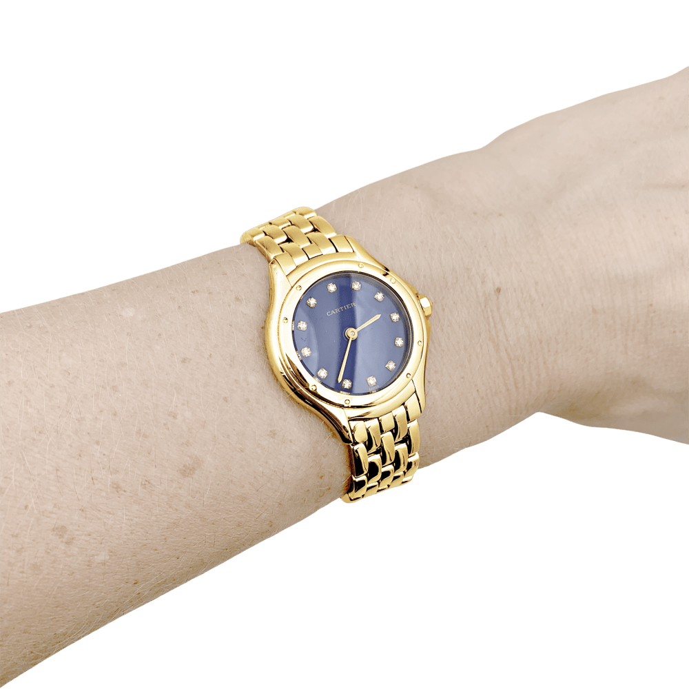 Montre Femme CARTIER, "Cougar", or jaune, index diamants.  6