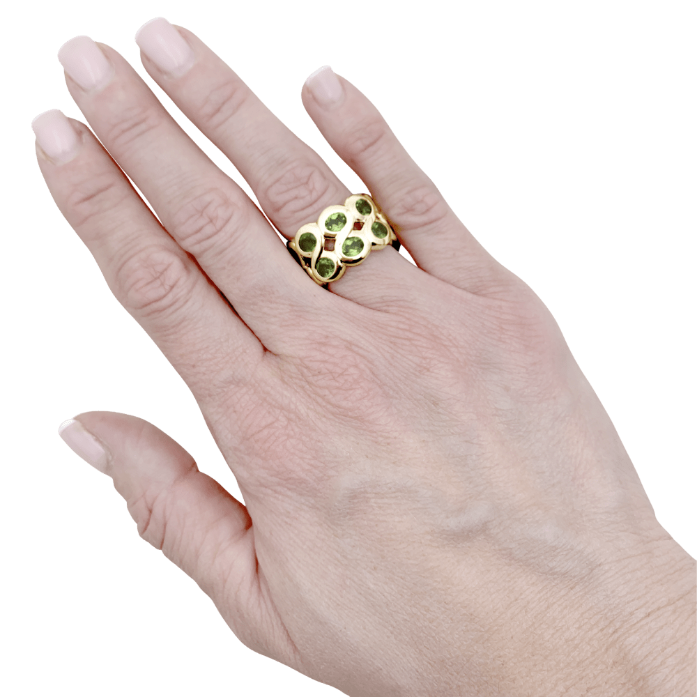 Bague bandeau or jaune et péridots. 7