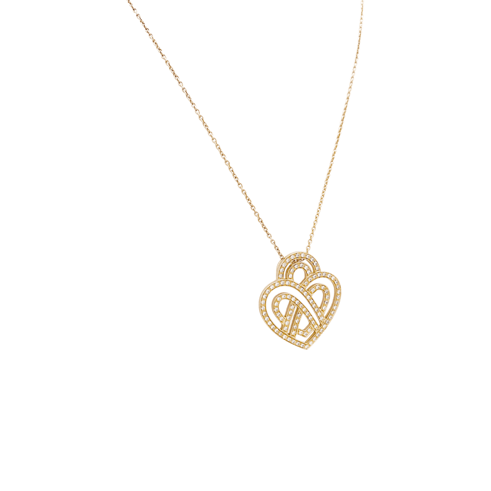 Collier Poiray, "Coeur entrelacé", or rose et diamants.  2