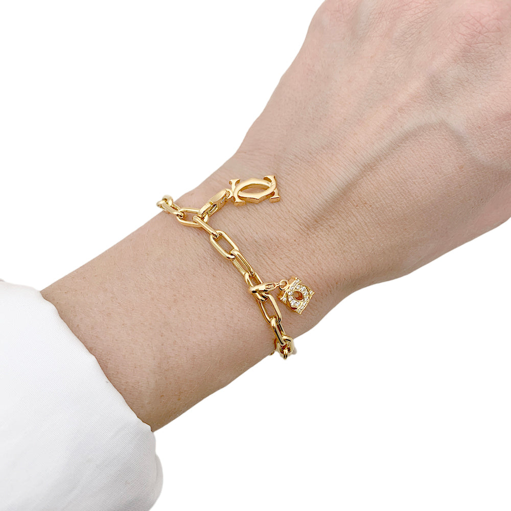 Bracelet Cartier breloques. 7