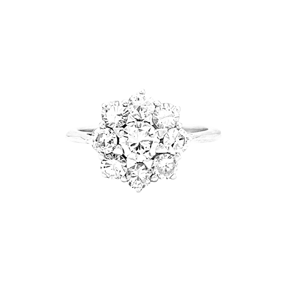Bague fleur en or blanc et platine sertie de diamants.  1