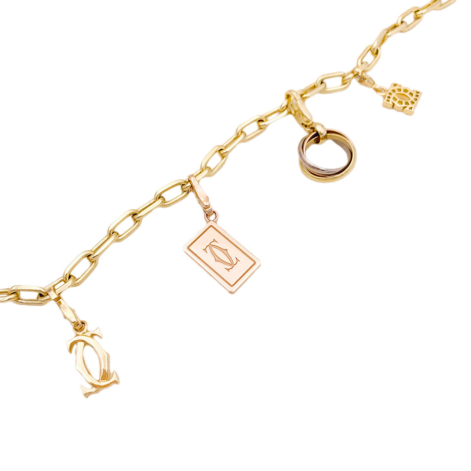 Bracelet Cartier breloques. 5