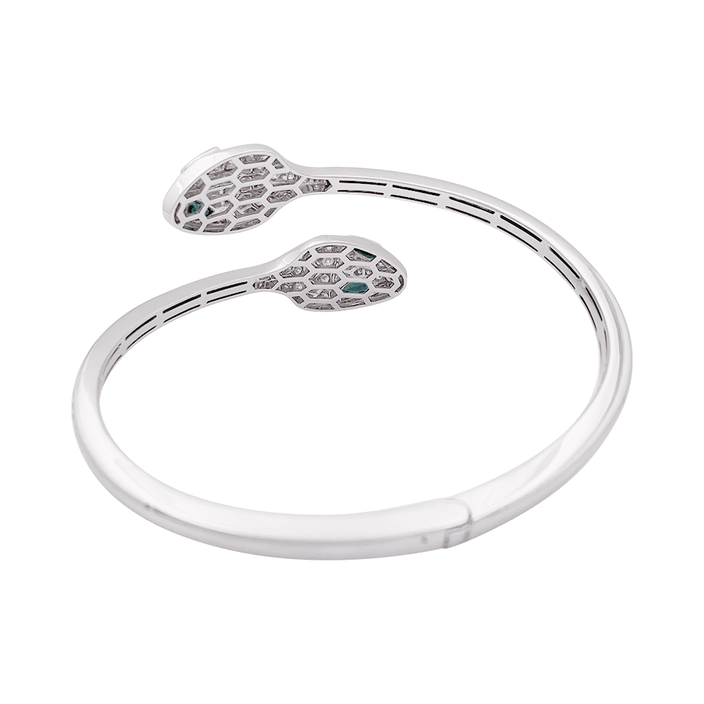 Bracelet Bulgari "Serpenti Seduttori" or blanc, diamants, émeraudes. 4