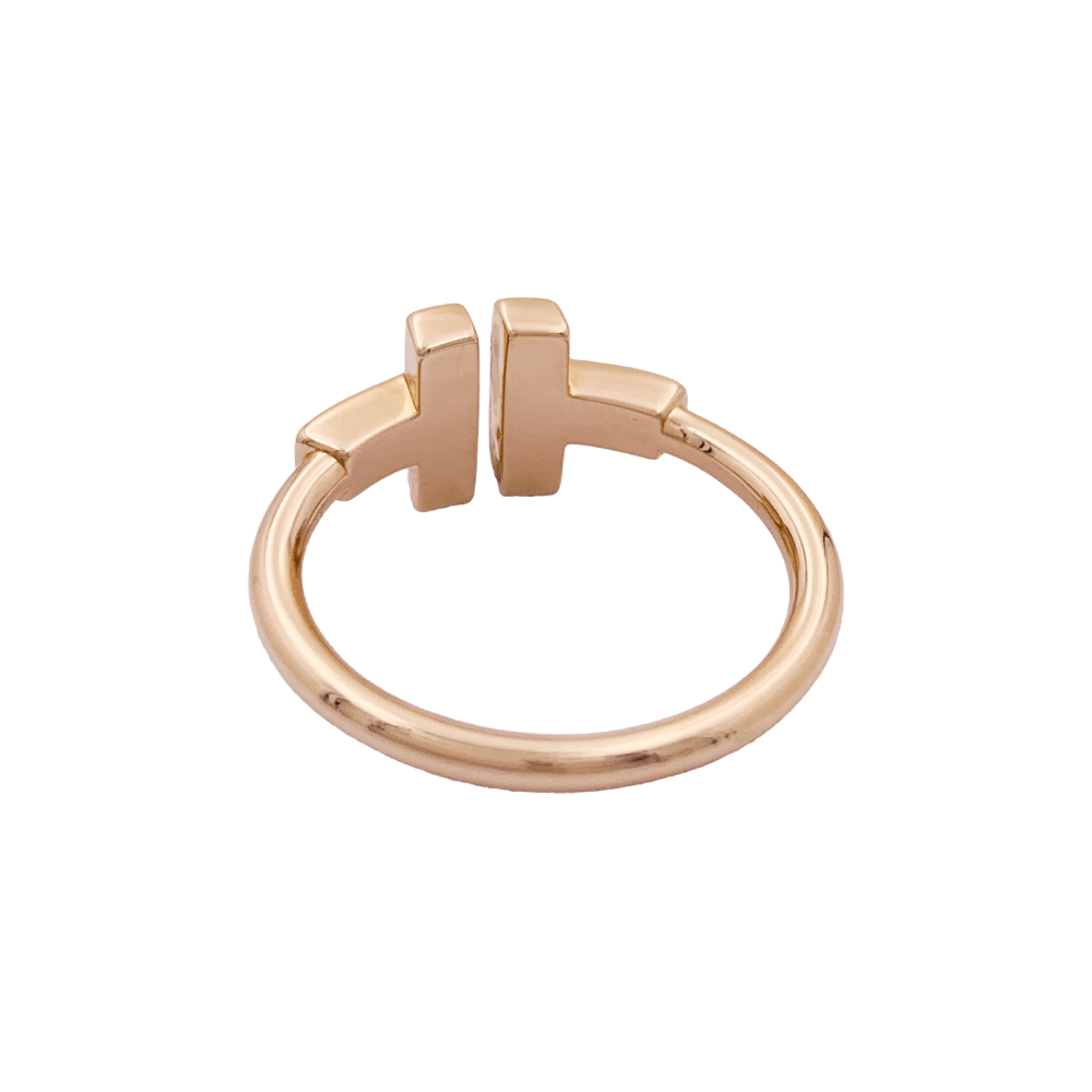 Bague Tiffany & Co, "Wire" collection "Tiffany T" or rose et onyx.  4