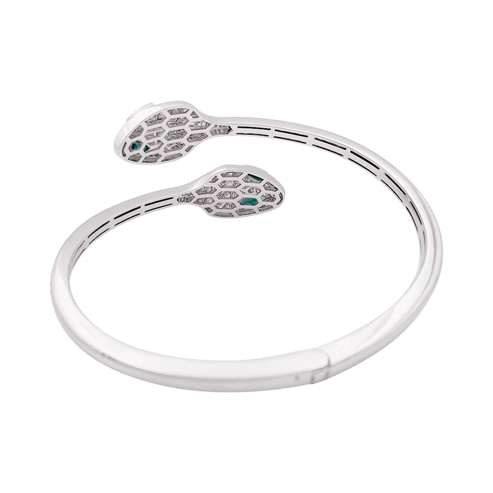 Bracelet Bulgari "Serpenti Seduttori" or blanc, diamants, émeraudes. 6