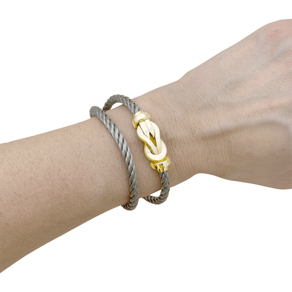 Bracelet Fred, "Chance infinie", or rose et acier. 6