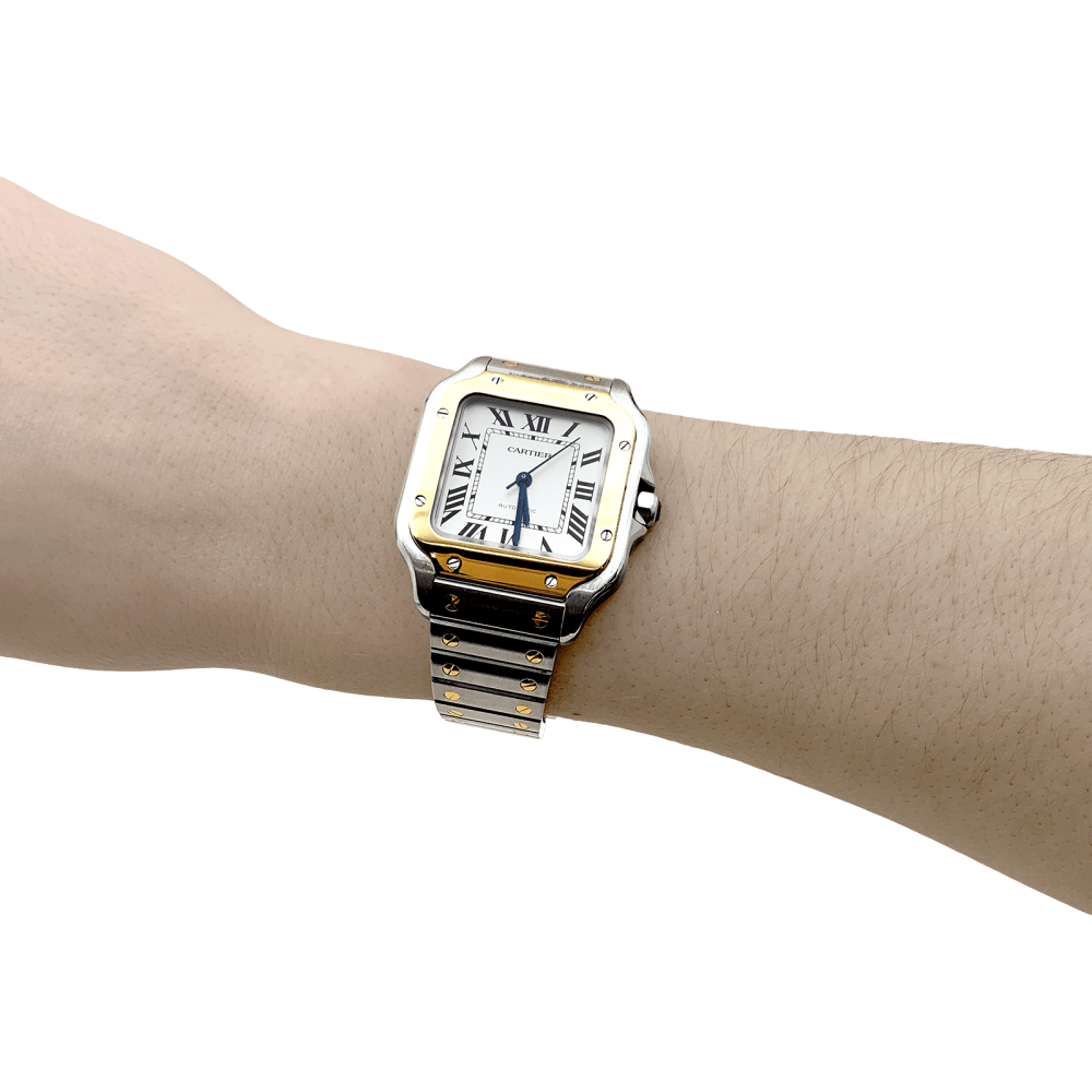 Montre Cartier, "Santos", acier et or.  8