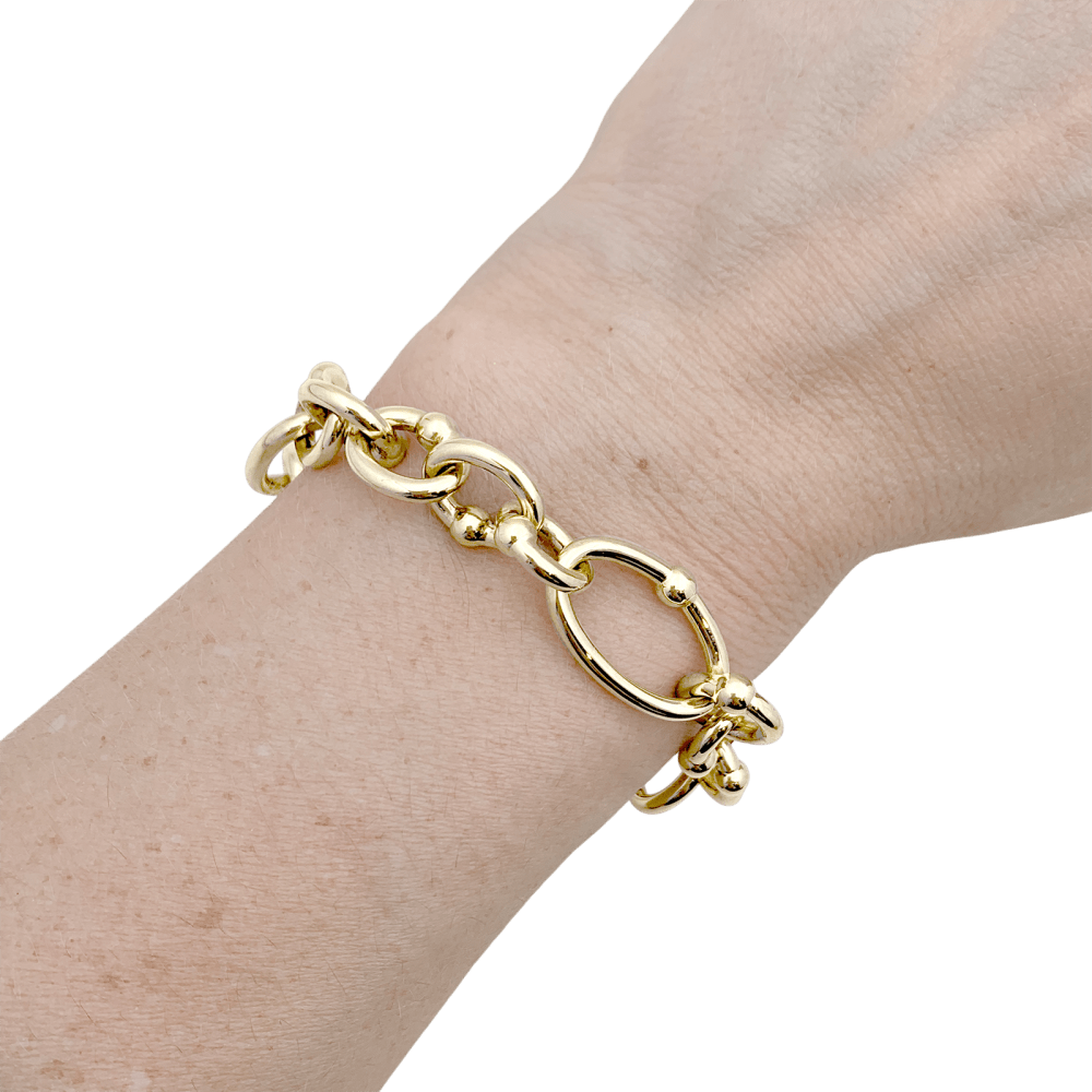 Bracelet maillons ovales et circulaires or jaune. 5