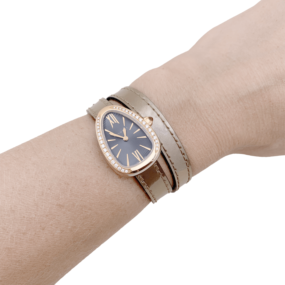Montre Bulgari, “Serpenti”, en or rose, diamants, acier, cuir.  8