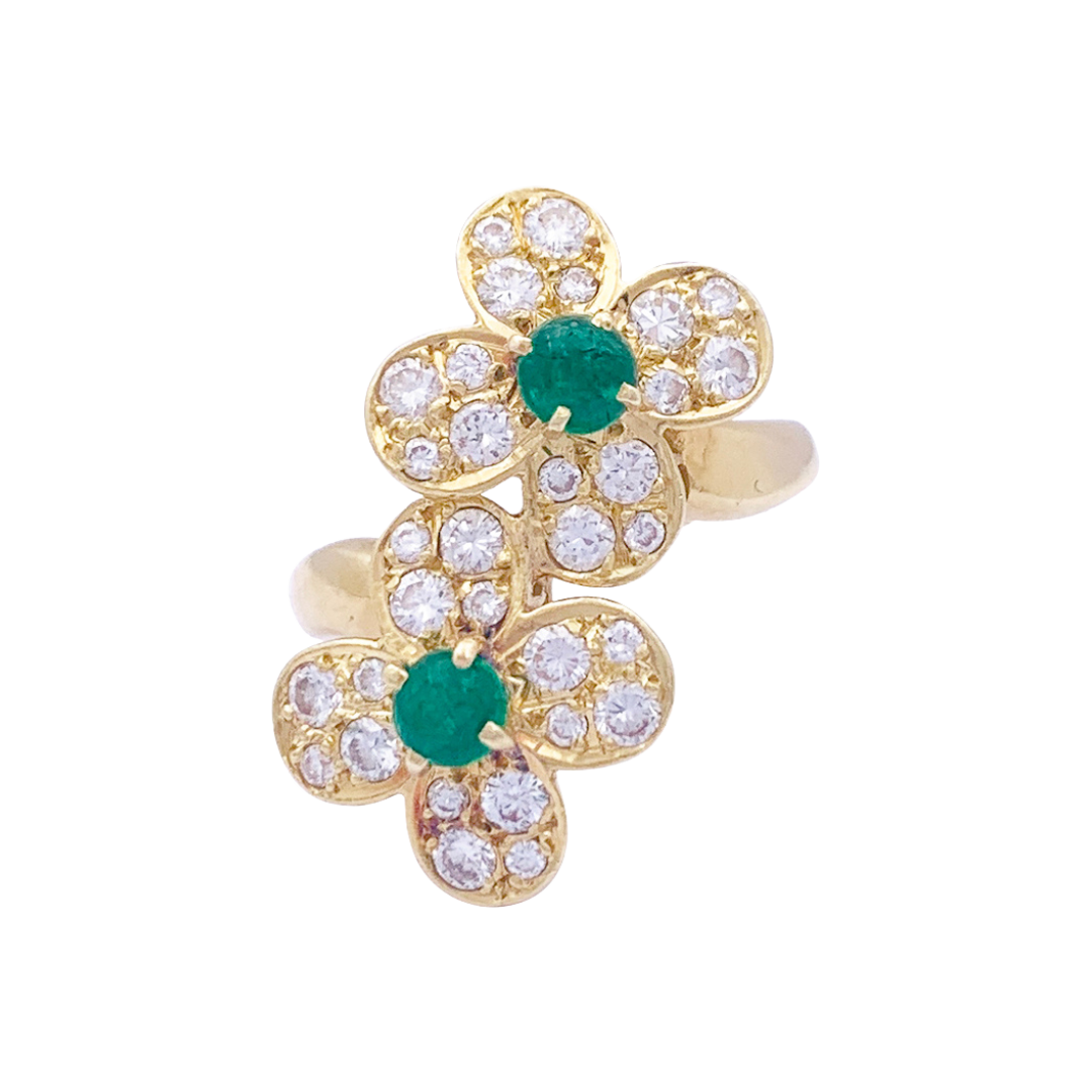 Bague Van Cleef & Arpels, "Fleurette", en or jaune, diamants et émeraudes.
