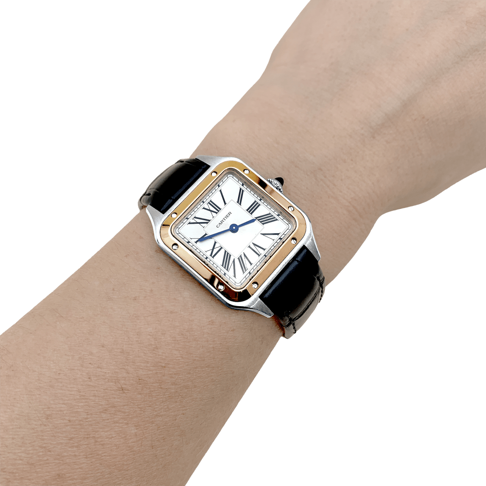 Montre Cartier, "Santos-Dumont", or, acier, cuir.  7